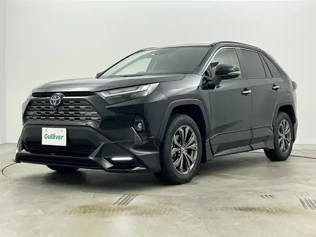 トヨタ ＲＡＶ４ ハイブリットG 岡山県 2023(令5)年 3.1万km アティチュードブラックマイカ 純正１０．５型ディスプレイオーディオ/（USB/HDMI/フルセグ/Carplay/AndroidAuto)/ＴＲＤエアロ（前/横/後下）/ガラスルーフ/ルーフレール/追従型クルーズコントロール/衝突軽減ブレーキ/踏み間違い防止/レーンキープアシスト/ブラインドスポットモニター/全周囲カメラ/コーナーセンサー（前/後）/合皮シート/パワーシート（運転席/助手席）/シートメモリ/シートヒーター（運転席/助手席）/エアシート（運転席/助手席）/ステアリングヒーター/電動リアゲート/LEDヘッドライト/オートハイビーム/フォグランプ/ドライブレコーダー（全方位）/純正18インチAW/スマートキー×1/禁煙車