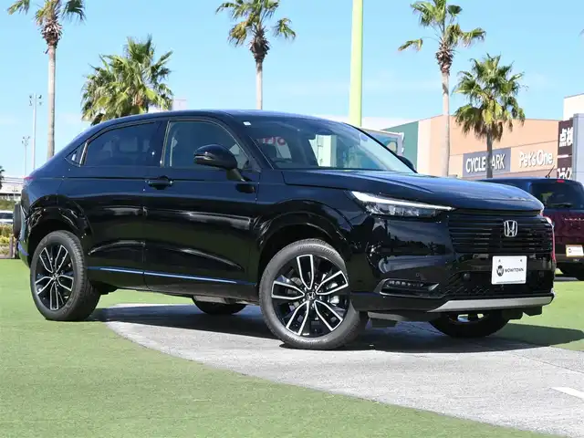 ホンダ ヴェゼル ハイブリッド e:HEV Z 千葉県 2025(令7)年 0.1千km クリスタルブラックパール e:HEV Z　4VC4AZ　Honda CONNECTディスプレー+ETC2.0車載器+ワイヤレス充電器(231000)/ホンダセンシング/・衝突軽減ブレーキ（CMBS）/・車線維持支援システム（LKAS）/・アダプティブクルーズコントロール（ACC）/・後方誤発進抑制機能/・誤発進抑制機能/パワーバックドア/ハーフレザーシート/前席シートヒーター/純正コネクトナビ/地デジTV/【Bluetooth接続】/【Apple CarPlay　Android Auto対応】/バックカメラ/ワイヤレス充電/革巻きステアリング/ステアリングヒーター/ステアリングスイッチ/パドルシフト/ETC（2.0）/LEDヘッドライト/フォグライト/ウインカーミラー/コーナーセンサー/純正18インチアルミホイル/サイド/カーテンエアバッグ/Honda スマートキー