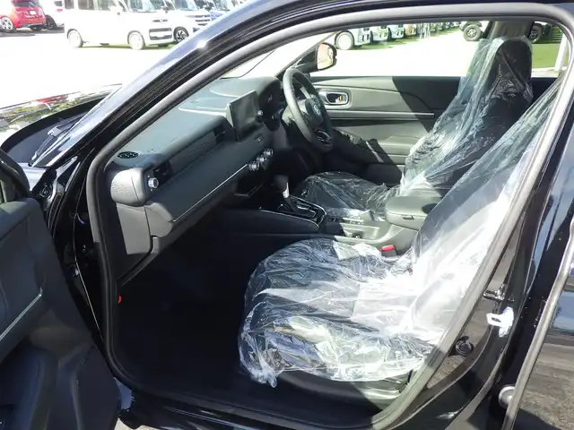 ホンダ ヴェゼル ハイブリッド e:HEV Z 千葉県 2025(令7)年 0.1千km クリスタルブラックパール e:HEV Z　4VC4AZ　Honda CONNECTディスプレー+ETC2.0車載器+ワイヤレス充電器(231000)/ホンダセンシング/・衝突軽減ブレーキ（CMBS）/・車線維持支援システム（LKAS）/・アダプティブクルーズコントロール（ACC）/・後方誤発進抑制機能/・誤発進抑制機能/パワーバックドア/ハーフレザーシート/前席シートヒーター/純正コネクトナビ/地デジTV/【Bluetooth接続】/【Apple CarPlay　Android Auto対応】/バックカメラ/ワイヤレス充電/革巻きステアリング/ステアリングヒーター/ステアリングスイッチ/パドルシフト/ETC（2.0）/LEDヘッドライト/フォグライト/ウインカーミラー/コーナーセンサー/純正18インチアルミホイル/サイド/カーテンエアバッグ/Honda スマートキー