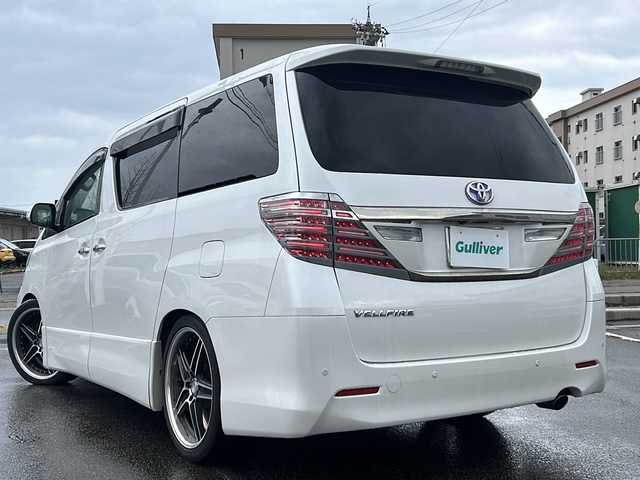 トヨタ ヴェルファイア 2．4Z Gエディション 石川県 2012(平24)年 17.5万km ホワイトパールクリスタルシャイン ワンオーナー/純正HDDナビゲーション/【HDD・CD/DVD・Bluetooth】/・フルセグTV/・バックカメラ/ビルドインETC/コーナーセンサー/クルーズコンtロール/ステアリングスイッチ/純正フリップダウンモニター/前席・2列目パワーシート/・メモリ付きシート/両側パワースライド/ウッドコンビステアリング/LEDライト/・フォグランプ/ローダウン/純正テールランプ車載