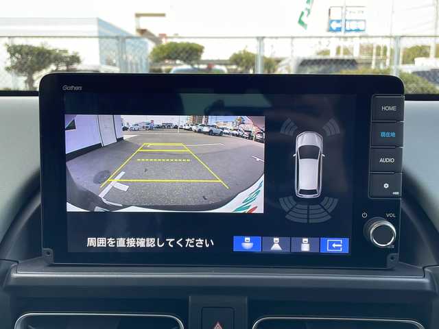 ホンダ フリード ハイブリット e:HEV クロスター 山口県 2025(令7)年 0.1千km メテオロイドグレーメタリック 登録済未使用車/純正9インチナビ　【LXM-242ZFNI】/・AM/FM/USB/Apple　CarPlay/Android Auto/フルセグテレビ/Bluetooth/バックモニター/ブラインドスポットモニター/スマートキー・スペアキー有/プッシュアップスタート/USBチャージャー/純正アルミホイール/電動格納ウインカーミラー/両側パワースライドドア/サーキュレーター/LEDヘッドランプ/フォグランプ/ハーフレザーシート/シートヒーター/ホンダセンシング/・衝突軽減ブレーキ/・誤発信抑制機能/・路外逸脱抑制機能/・アダプティブクルーズコントロール/・車線維持支援システム/・オートハイビーム/・パーキングセンサーシステム/取扱説明書/保証書