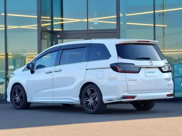 ホンダ オデッセイ ハイブリッド e:HEVアブソルート EXブラックED 東京都 2024(令6)年 0.8万km プラチナホワイトパール 純正11インチナビ/フルセグ/全方位カメラ/フリップダウンモニター/ビルトインETC/両側パワースライドドア/ワイヤレス充電/パドルシフト/レザーシート/シートヒーター/オットマン/パワーテールゲート/衝突軽減ブレーキ/レーンキープアシスト/ブラインドスポットモニター/コーナーセンサー/LEDヘッドライト