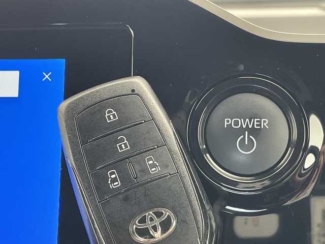 トヨタ ヴォクシー ハイブリッド S－Z 愛知県 2023(令5)年 3.5万km ホワイトパールクリスタルシャイン トヨタチームメイト/アドバンストパーク/アドバンストドライブ/純正ディズプレイオーディオナビ/フリップダウンモニター/両側パワースライドドア/レーダークルーズコントロール/シートヒーター/バックカメラ/ヘッドアップディスプレイ/コーナーセンサー/純正アルミホイール/ETC2.0/ブラインドスポットモニター/LEDヘッドライト/インテリジェントミラー/リアオートエアコン/オートマチックハイビーム/ドライブレコーダー/衝突軽減システム/Bluetooth/ステアリングスイッチ/スマートキー/プッシュスタート