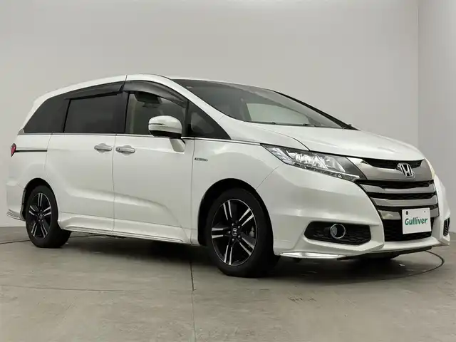 ホンダ オデッセイ ハイブリッド アブソルート・EXホンダセンジング 愛知県 2017(平29)年 4.9万km ホワイトオーキッドパール 純正ナビ/（Bluetooth/CD/DVD/SD/AM/FM）/バックカメラ/ETC/ブラインドスポットモニター/ドライブレコーダー/レザーシート/両側パワースライドドア/3列シート/オットマン/純正フロアマット/純正AW/オートライト/スマートキー/純正ナビ/（Bluetooth/CD/DVD/SD/AM/FM）/バックカメラ/ETC/ブラインドスポットモニター/ドライブレコーダー/レザーシート/3列シート/オットマン/純正フロアマット/純正AW/オートライト/スマートキー/ドアバイザー/ステアリングリモコン