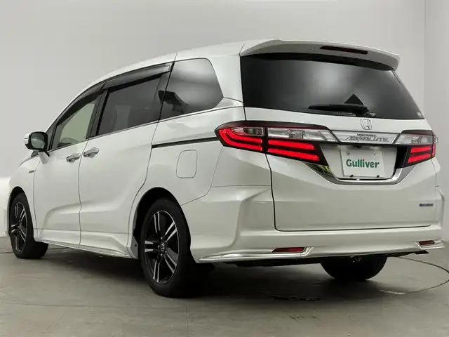 ホンダ オデッセイ ハイブリッド アブソルート・EXホンダセンジング 愛知県 2017(平29)年 4.9万km ホワイトオーキッドパール 純正ナビ/（Bluetooth/CD/DVD/SD/AM/FM）/バックカメラ/ETC/ブラインドスポットモニター/ドライブレコーダー/レザーシート/両側パワースライドドア/3列シート/オットマン/純正フロアマット/純正AW/オートライト/スマートキー/純正ナビ/（Bluetooth/CD/DVD/SD/AM/FM）/バックカメラ/ETC/ブラインドスポットモニター/ドライブレコーダー/レザーシート/3列シート/オットマン/純正フロアマット/純正AW/オートライト/スマートキー/ドアバイザー/ステアリングリモコン