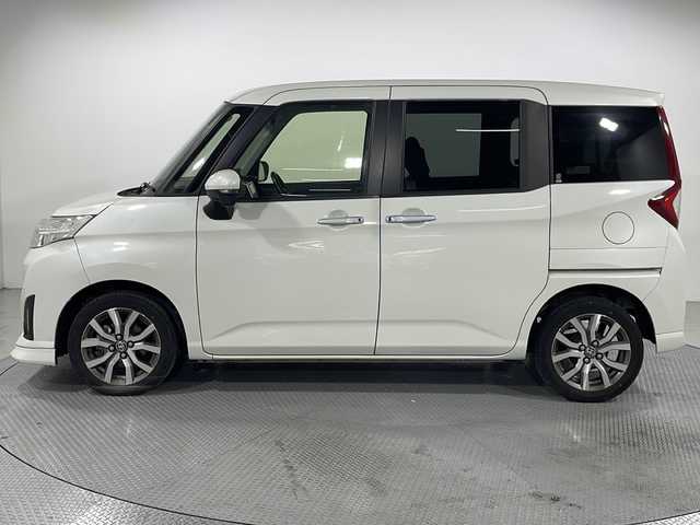 トヨタ ルーミー 広島県 2020(令2)年 5.6万km パール 禁煙車/社外9インチナビ（AVIC-RQ903）/クルーズコントロール/スマートアシスト/両側パワースライドドア/スマートキー/クリアランスソナー/レーンキープ/オートマチックハイビーム/純正15インチアルミホイール/純正フロアマット/LEDヘッドライト/スペアキー/ETC