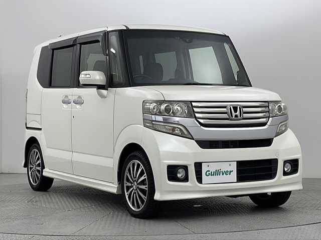 ホンダ Ｎ ＢＯＸ カスタム G ターボ Aパッケージ 新潟県 2014(平26)年 7.4万km プレミアムホワイトパール 社外メモリナビ/フルセグ/　CD/DVD/Bluetooth/バックカメラ/両側パワースライドドア/スマートキー×２/クルーズコントロール/衝突被害軽減ブレーキ/横滑り防止装置/プッシュスタート/キセノンヘッドライト/オートライト/フォグランプ/電動格納式ミラー/ETC