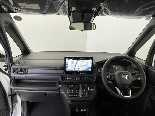 ホンダ ステップワゴン スパーダ eHEV 群馬県 2025(令7)年 0.1千km プラチナホワイトパール 登録済み未使用車　純正11.4インチナビ　バックカメラ　衝突軽減　両側パワースライドドア　BSM　アダプティブクルーズコントロール　レーンアシスト　パワーリアゲート　オットマン　シートヒーター　禁煙車