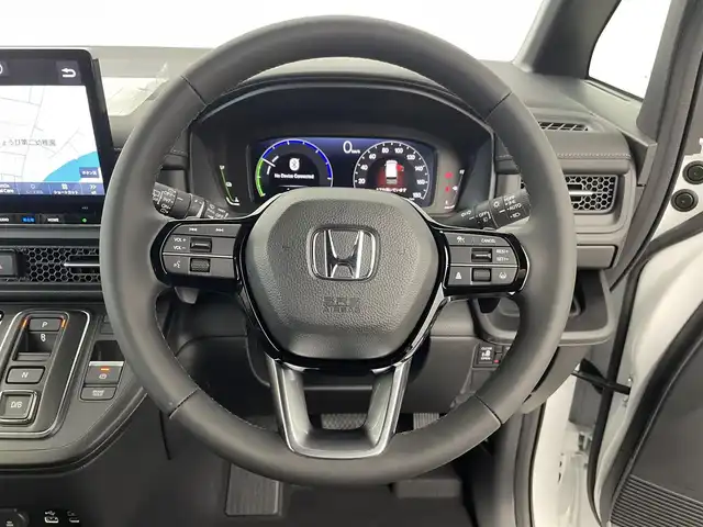 ホンダ ステップワゴン スパーダ eHEV 群馬県 2025(令7)年 0.1千km プラチナホワイトパール 登録済み未使用車　純正11.4インチナビ　バックカメラ　衝突軽減　両側パワースライドドア　BSM　アダプティブクルーズコントロール　レーンアシスト　パワーリアゲート　オットマン　シートヒーター　禁煙車