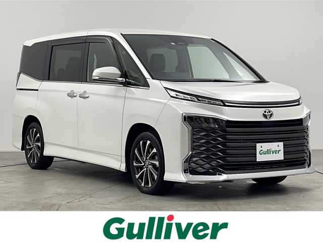 トヨタ ヴォクシー S－Z 愛知県 2022(令4)年 2.5万km ホワイトパールクリスタルシャイン /禁煙車//コネクティッドナビ対応ディスプレイオーディオ//フルセグTV//ビルトインETC2.0//バックカメラ//純正フリップダウンモニター//トヨタセーフティセンス//プリクラッシュセーフティ//緊急時操舵支援+FCTA+LDA//LTA+LDA//レーダークルーズ//オートハイビーム//ロードサインアシスト//ドライバー異常時対応システム//プロアクティブドライビングアシスト//パーキングサポートブレーキ//LEDヘッドライト//オートライト//両側ワンタッチパワースライドドア//スライドドアサンシェード//合皮コンビシート//前席シートヒーター//2列目キャプテンシート(折り畳み式大型テーブル付)//3列目スペースアップシート//純正17インチアルミホイール//純正ドアバイザー//革巻きステアリング//ステアリングスイッチ//プッシュスタート//電動格納ミラーウィンカー//新車保証書・取扱説明書