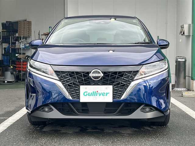 日産 ノート X FOUR 京都府 2021(令3)年 1.8万km オーロラフレアブルーパール 社外７型SDナビ/衝突軽減装置　/バックカメラ　/フルセグ　/禁煙車　/コーナーセンサー /４WD /ＬＥＤヘッドライト　/スマートキー /前席シートヒーター /ＥＴＣ /電動格納ミラー /プッシュスタート