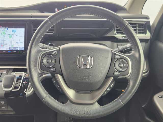 ホンダ ステップワゴン スパーダ eHEV G EXホンダS 愛知県 2020(令2)年 4.5万km プラチナホワイトパール ホンダセンシング/・衝突軽減ブレーキ/・誤発進抑制装置/・先行発進お知らせ機能/純正9型ナビ/・フルセグTV/・Bluetooth/・CD/DVD/両側パワースライドドア/バックカメラ/アダプティブクルーズコントロール/社外前後ドライブレコーダー/ハーフレザーシート/シートヒーター　/革巻きステアリング　/ステアリングリモコン/純正フロアマット/純正16インチAW/LEDライト/ETC2.0