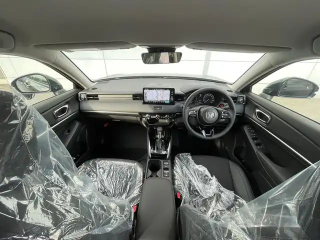 ホンダ ヴェゼル ハイブリッド e:HEV Z 千葉県 2025(令7)年 0.1千km クリスタルブラックパール 登録済未使用車/・登録時走行距離5km/ホンダセンシング/・衝突軽減ブレーキ/レーンキープアシスト/・レーダークルーズコントロール/オートハイビーム/・クリアランスソナー/ブラインドスポットモニター/純正9インチコネクトナビ/・フルセグ/BT/USB/カープレイ/バックカメラ/ステアリングスイッチ/パドルシフト/ETC2.0/ハーフレザーシート/シートヒーター(D/N席)/パワーシート()/ワイヤレス充電/パワーバックドア/電動パーキングブレーキ/ブレーキホールド/LEDヘッドライト/オートライト/フォグライト/スマートキー/プッシュスタート/純正18インチAW