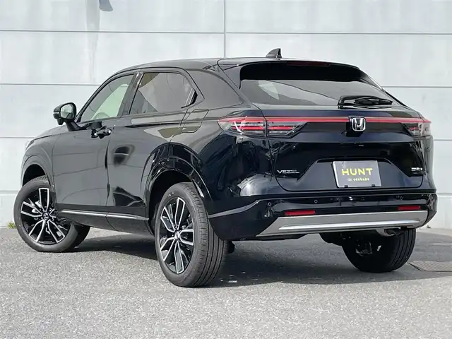 ホンダ ヴェゼル ハイブリッド e:HEV Z 千葉県 2025(令7)年 0.1千km クリスタルブラックパール 登録済未使用車/・登録時走行距離5km/ホンダセンシング/・衝突軽減ブレーキ/レーンキープアシスト/・レーダークルーズコントロール/オートハイビーム/・クリアランスソナー/ブラインドスポットモニター/純正9インチコネクトナビ/・フルセグ/BT/USB/カープレイ/バックカメラ/ステアリングスイッチ/パドルシフト/ETC2.0/ハーフレザーシート/シートヒーター(D/N席)/パワーシート()/ワイヤレス充電/パワーバックドア/電動パーキングブレーキ/ブレーキホールド/LEDヘッドライト/オートライト/フォグライト/スマートキー/プッシュスタート/純正18インチAW