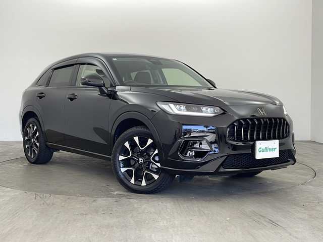 ホンダ ＺＲ－Ｖ ハイブリッド e:HEV Z 兵庫県 2024(令6)年 2.8万km クリスタルブラックパール ・Honda SENSING/・衝突軽減ブレーキ/・先行車発進お知らせ機能/・歩行者事故低減ステアリング/・路外逸脱抑制機能/・標識認識機能/・渋滞追従機能付アダプティブクルーズコントロール/・車線維持支援システム/・トラフィックジャムアシスト（渋滞運転支援機能）/・ブラインドスポットインフォメーション/・誤発進抑制機能/・後方誤発進抑制機能/・近距離衝突軽減ブレーキ/・パーキングセンサーシステム/・後退出庫サポート/・オートハイビーム/・アダプティブドライビングビーム/・BOSEプレミアムサウンドシステム/・純正9インチナビ＆フルセグ＆BT＆USB＆AppleCarPlay/・マルチビューカメラシステム/・ハンズフリーアクセスパワーテールゲート/・本革シート/・前席シートヒーター/・前席パワーシート/・運転席メモリーシート/・革巻きステアリング/・ステアリングリモコン/・ステアリングヒーター/・ワイヤレス充電/・ビルトインETC2.0/・パドルシフト/・横滑り防止装置/・純正フロアマット/・前席ゴムマットあり/・純正18インチアルミホイール/・LEDヘッドライト/・フォグ/・ドアバイザー