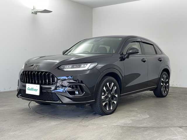ホンダ ＺＲ－Ｖ ハイブリッド e:HEV Z 兵庫県 2024(令6)年 2.8万km クリスタルブラックパール ・Honda SENSING/・衝突軽減ブレーキ/・先行車発進お知らせ機能/・歩行者事故低減ステアリング/・路外逸脱抑制機能/・標識認識機能/・渋滞追従機能付アダプティブクルーズコントロール/・車線維持支援システム/・トラフィックジャムアシスト（渋滞運転支援機能）/・ブラインドスポットインフォメーション/・誤発進抑制機能/・後方誤発進抑制機能/・近距離衝突軽減ブレーキ/・パーキングセンサーシステム/・後退出庫サポート/・オートハイビーム/・アダプティブドライビングビーム/・BOSEプレミアムサウンドシステム/・純正9インチナビ＆フルセグ＆BT＆USB＆AppleCarPlay/・マルチビューカメラシステム/・ハンズフリーアクセスパワーテールゲート/・本革シート/・前席シートヒーター/・前席パワーシート/・運転席メモリーシート/・革巻きステアリング/・ステアリングリモコン/・ステアリングヒーター/・ワイヤレス充電/・ビルトインETC2.0/・パドルシフト/・横滑り防止装置/・純正フロアマット/・前席ゴムマットあり/・純正18インチアルミホイール/・LEDヘッドライト/・フォグ/・ドアバイザー
