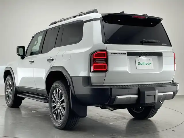 トヨタ ランドクルーザー ２５０ ZX 愛知県 2024(令6)年 0.4万km プラチナホワイトパールマイカ 純正１２．３型ナビ　Ｇｒｇｏセキュリティ　ムーンルーフ　ＪＢＬ　デジイン　茶革　全方位カメラ　ヒッチメンバー　ＥＴＣ２．０　ベンチレーション　ＢＳＭ　ワイヤレス充電　ＨＤＭＩ　トヨタチームメイト　禁煙　モデリスタ