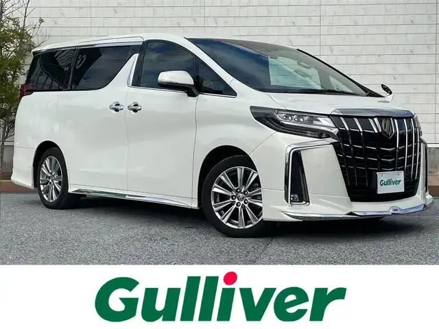 トヨタ アルファード S タイプゴールド 滋賀県 2021(令3)年 4.8万km ラグジュアリーホワイトパールクリスタルシャインガラスフレーク モデリスタエアロ/フリップダウンモニター/両側パワースライドドア/純正9インチナビ/（AM/FM/CD/DVD/フルセグ/Bluetooth/USB）/バックカメラ/ドライブレコーダー/ビルトインETC/デジタルインナーミラー/トヨタセーフティセンス/・踏み間違い防止アシスト/・ブレーキアシスト/・プリクラッシュブレーキアシスト/・ヒルスタート（坂道発進）アシスト/・前方衝突防止支援システム/・VDC（ビークルダイナミクスコントロール）/・レーンキープアシスト/・車間自動制御システム/・ASCD（オートスピードコントロール装置）/・ABS（アンチロックブレーキシステム）/・標識検知機能/・盗難防止アラーム	/電動格納ミラー/電子パーキング/ブレーキホールド/ステアリングスイッチ/オートライト/オートハイビーム/LEDヘッドライト/フロントフォグ/フルオートエアコン/USB端子/プッシュスタート/スマートキー