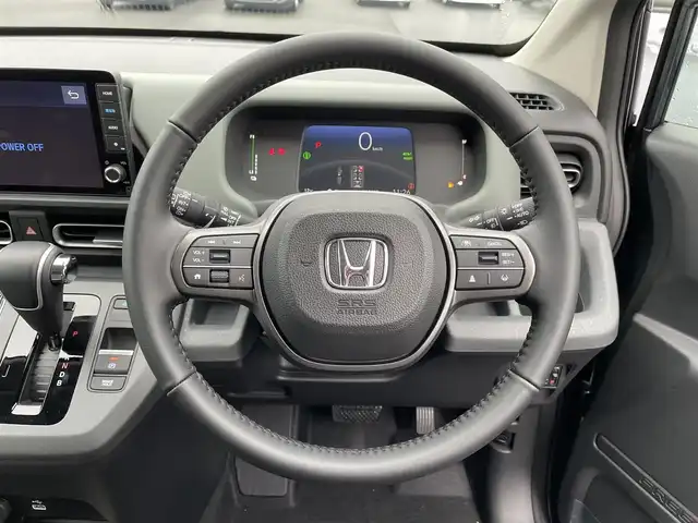 ホンダ フリード ハイブリット e:HEV クロスター 滋賀県 2025(令7)年 0.1千km メテオロイドグレーメタリック 登録済未使用車/純正9インチナビ/【Bluetooth/USB/フルセグTV//AppleCarPlay/AndroidAuto】/両側パワースライドドア/ハーフレザーシート/シートヒーター/LEDヘッドランプ/リアクーラー/ホンダセンシング/・衝突軽減ブレーキ/・誤発進抑制機能/・後方誤発進抑制機能/・近距離衝突軽減ブレーキ/・歩行者事故低減ステアリング/・路外逸脱抑制機能/・渋滞追従機能付アダプティブクルーズコントロール/・車線維持支援システム/・トラフィックジャムアシスト/・先行車発進お知らせ機能/・標識認識機能/・オートハイビーム/・パーキングセンサーシステム/・ブラインドスポットインフォメーション/電動パーキングブレーキ/オートホールド/スマートキー/ステアリングスイッチ