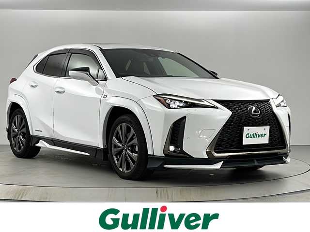 レクサス ＵＸ 250h Fスポーツ 兵庫県 2021(令3)年 5.8万km ホワイトノーヴァガラスフレーク 外部検査実施済み/・ワンオーナー/・内装Fスポーツ専用フレアレッド/・TRDエアロ//フロントスポイラー//サイドスカート//エアロフェンダー//リヤディフューザー//スポーツマフラー/【メーカーOP】//3眼フルLEDヘッドランプ（ヘッドランプクリーナー付）//AHS（アダプティブハイビームシステム）//パノラミックビューモニター//BSM//PKSB//チルト&スライド　ムーンルーフ//前席シートベンチレーション//・メーカーSDナビ/・地デジ/DVD/BT/USB/AUX/・ステアリングリモコン/・TVキャンセラー/・ステアリングヒーター/・ドライブレコーダー（前方）/・パドルシフト/・ビルトインETC/・純正18インチAW/・前席シートヒーター/・パワーバックドア/・スペアキー、カードキーあり/・Lexus Safety Systemプラス//プリクラッシュセーフティ（PCS）//レーントレーシングアシスト（LTA）//ロードサインアシスト（RSA）//レーダークルーズコントロール//先行車発進お知らせ（TMN）