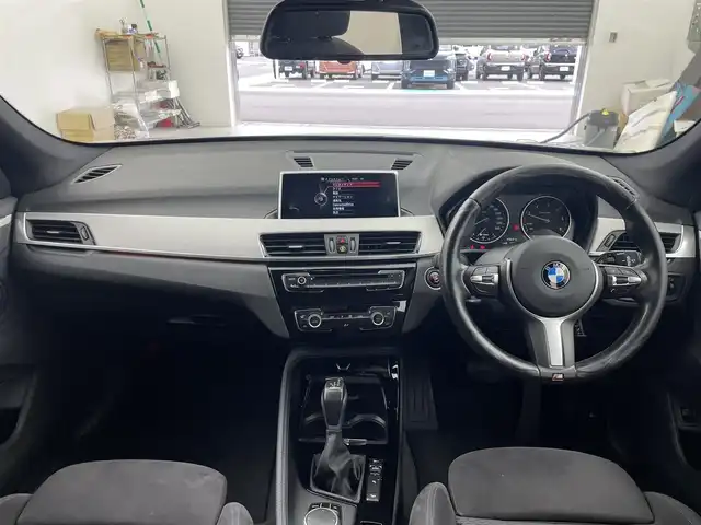 ＢＭＷ Ｘ１ xDrive 18d Mスポーツ 大分県 2016(平28)年 9.8万km グレー メーカーナビ/DVD/Bluetooth/バックカメラ/コーナーセンサー/オートLEDライト/前方ドライブレコーダー/衝突軽減ブレーキ/純正18インチAW/純正フロアマット/スマートキーX2/保証書/取扱説明書