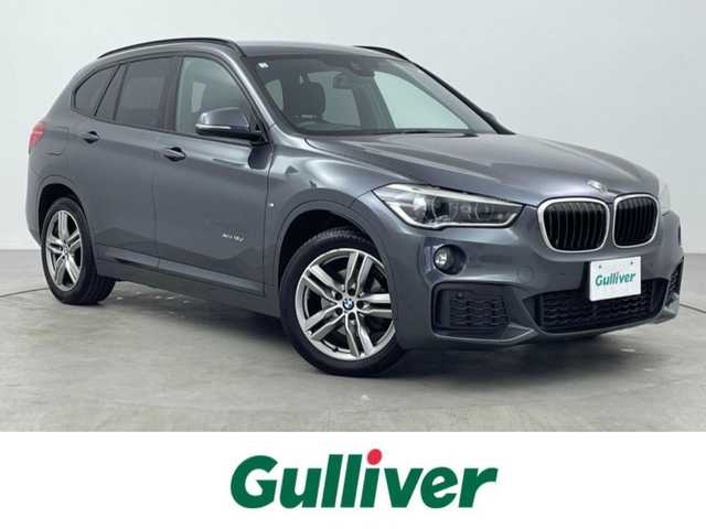 ＢＭＷ Ｘ１ xDrive 18d Mスポーツ 大分県 2016(平28)年 9.8万km グレー メーカーナビ/DVD/Bluetooth/バックカメラ/コーナーセンサー/オートLEDライト/前方ドライブレコーダー/衝突軽減ブレーキ/純正18インチAW/純正フロアマット/スマートキーX2/保証書/取扱説明書