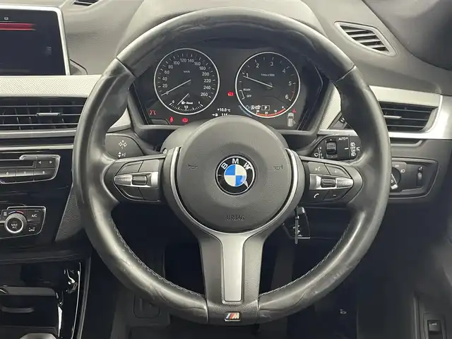 ＢＭＷ Ｘ１ xDrive 18d Mスポーツ 大分県 2016(平28)年 9.8万km グレー メーカーナビ/DVD/Bluetooth/バックカメラ/コーナーセンサー/オートLEDライト/前方ドライブレコーダー/衝突軽減ブレーキ/純正18インチAW/純正フロアマット/スマートキーX2/保証書/取扱説明書