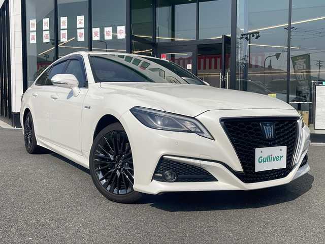 トヨタ クラウン ハイブリッド S スポーツスタイル 兵庫県 2020(令2)年 8.4万km ホワイトパールクリスタルシャイン 純正8型ナビ(BT/DVD/Blu-ray)/フルセグTV/バックカメラ/ビルトインETC2.0/ユピテルドライブレコーダー/レーダークルーズコントロール/クリアランスソナー/セーフティセンス/・レーントレーシングアシスト/・プリクラッシュセーフティ/・オートマチックハイビーム/・ロードサインアシスト/・先行車発進告知機能/ブラインドスポットモニター/リアクロストラフィックオートブレーキ/リアクロストラフィックアラート/スモーク加飾LEDヘッドランプ/本革巻きステアリング/ステアリングヒーター/パドルシフト/合皮/ファブリックコンビシート/前席パワーシート/シートヒーター/純正18インチアルミホイール/スマートエントリー/スタートシステム/禁煙車