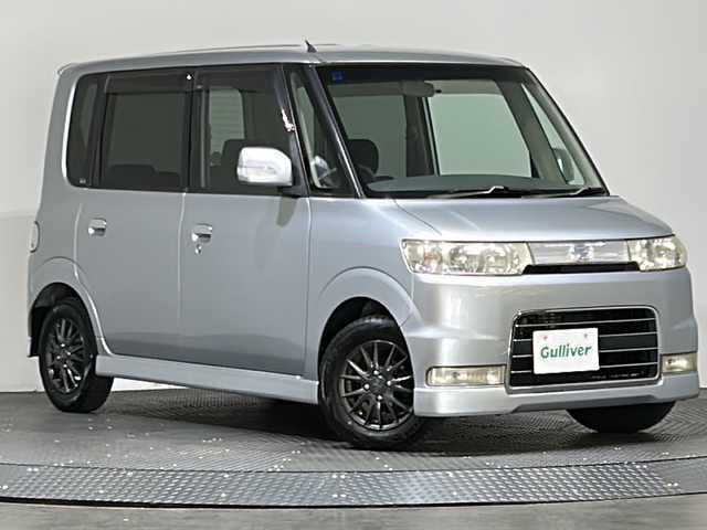 ダイハツ タント カスタム VS 愛媛県 2007(平19)年 5.1万km ウォームシルバーメタリック 社外オーディオ　ハーフレザーシート　社外フロアマット　社外アルミホイール　リモコンキー　　ＡＣ　ＡＢＳ　Ｗエアバック　キセノンヘッドライト　パワーステアリング　パワーウィンドウ