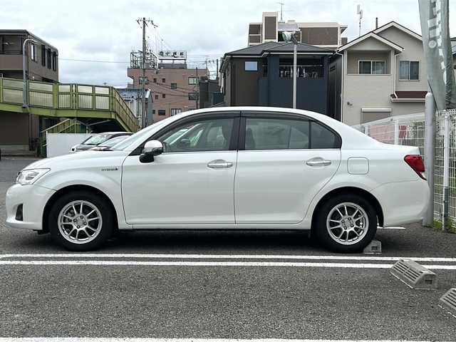 トヨタ カローラ アクシオ ハイブリッドG 兵庫県 2014(平26)年 5.3万km ホワイトパールクリスタルシャイン 純正ナビ/フルセグTV/Bluetooth/バックカメラ/OP/・前席シートヒーター/・スマートエントリー/スタートシステム/・HIDヘッドランプ/オートライト/ＥＴＣ/ドライブレコーダー/取扱説明書・保証書・スペアキー