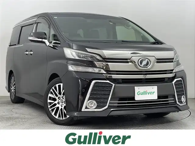トヨタ ヴェルファイア Z Gエディション 道央・札幌 2015(平27)年 4.9万km バーニングブラッククリスタルシャインガラスフレーク ・4WD/・衝突被害軽減ブレーキ/・レーダークルーズコントロール/・メーカーナビ/・アラウンドビューモニター/・フルセグＴＶ/・Ｂｌｕｅｔｏｏｔｈ/・ＪＢＬサウンド/・両側パワースライドドア/・パワーバックドア/・ビルトインＥＴＣ/・パワーシート/・シートメモリ/・ＨＫＳ車高調/・アイドリングストップ/・ステアリングヒーター
