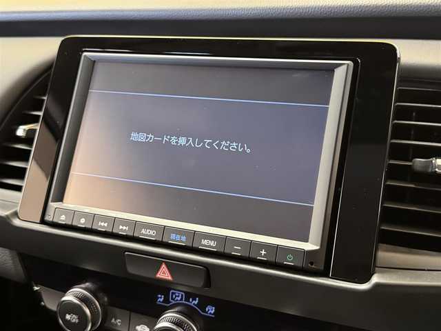 ホンダ フィット e:HEVホーム 群馬県 2020(令2)年 7.7万km クリスタルブラックパール ホンダセンシング/純正8インチSDナビ/　　CD/DVD/BT/フルセグ/USB/iPod/バックカメラ/レーダークルーズコントロール/LEDオートライト/オートハイビーム/ハーフレザーシート/純正16インチAW/コーナーセンサー/前後ドライブレコーダー/レーンアシスト/オートブレーキホールド/ステアリングスイッチ/横滑り防止装置/サイド・カーテンエアバッグ/スマートキー/ビルトインETC