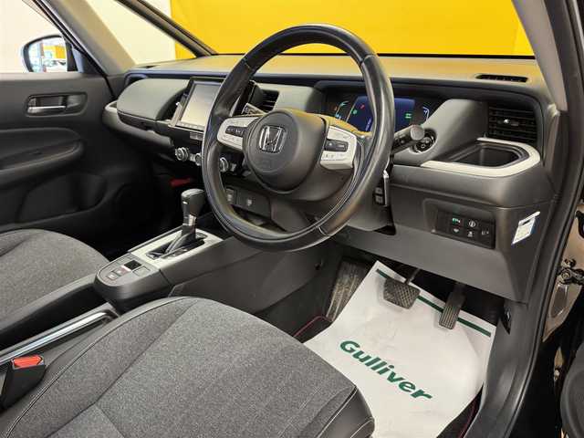 ホンダ フィット e:HEVホーム 群馬県 2020(令2)年 7.7万km クリスタルブラックパール ホンダセンシング/純正8インチSDナビ/　　CD/DVD/BT/フルセグ/USB/iPod/バックカメラ/レーダークルーズコントロール/LEDオートライト/オートハイビーム/ハーフレザーシート/純正16インチAW/コーナーセンサー/前後ドライブレコーダー/レーンアシスト/オートブレーキホールド/ステアリングスイッチ/横滑り防止装置/サイド・カーテンエアバッグ/スマートキー/ビルトインETC
