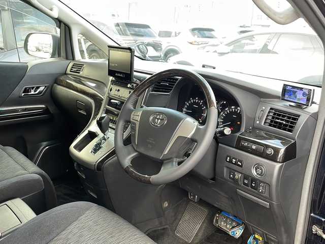 トヨタ ヴェルファイア 2．4Z Gエディション 道北・旭川 2012(平24)年 7.7万km ダークブルーマイカ /寒冷地仕様//社外ナビ/CD/DVD/BT/MSV/TV//バックカメラ//両側パワースライドドア//電動リアゲート//4WD//クルーズコントロール//オートライト//前席・2列目パワーシート//メモリーシート//ビルトインETC//HIDヘッドライト//ECOモード//クリアランスソナー//フロントデアイサー//フォグランプ//純正フロアマット//ドアバイザー//保証書
