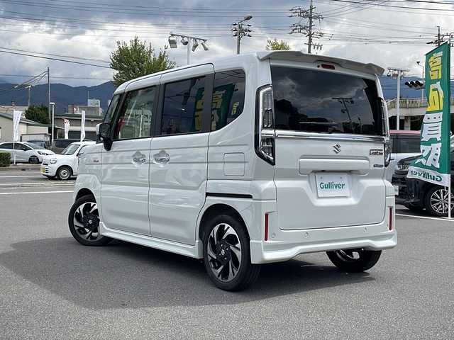 スズキ スペーシア カスタム HYBRID XS ターボ 長野県 2023(令5)年 0.6万km ピュアホワイトP 純正9インチメモリナビ/AppleCarPlay対応/Bluetooth Audio/フルセグテレビ/全方位カメラ・バックカメラ/レーダークルーズコントロール/純正15インチアルミホイール/両側パワースライドドア/ヘッドアップディスプレイ/前後コーナーセンサー/衝突被害軽減ブレーキ/ステアリングヒーター/ハーフレザーシート/前席シートヒーター/アイドリングストップ/ステアリングスイッチ/パドルシフト/LEDヘッドライト/オートハイビーム/オートライト/フォグランプ/純正フロアマット/プッシュスタート/スマートキー/スペアキー/取扱説明書/保証書