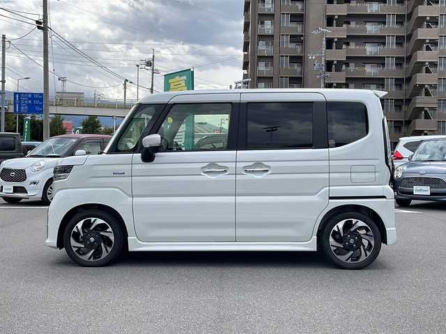 スズキ スペーシア カスタム HYBRID XS ターボ 長野県 2023(令5)年 0.6万km ピュアホワイトP 純正9インチメモリナビ/AppleCarPlay対応/Bluetooth Audio/フルセグテレビ/全方位カメラ・バックカメラ/レーダークルーズコントロール/純正15インチアルミホイール/両側パワースライドドア/ヘッドアップディスプレイ/前後コーナーセンサー/衝突被害軽減ブレーキ/ステアリングヒーター/ハーフレザーシート/前席シートヒーター/アイドリングストップ/ステアリングスイッチ/パドルシフト/LEDヘッドライト/オートハイビーム/オートライト/フォグランプ/純正フロアマット/プッシュスタート/スマートキー/スペアキー/取扱説明書/保証書