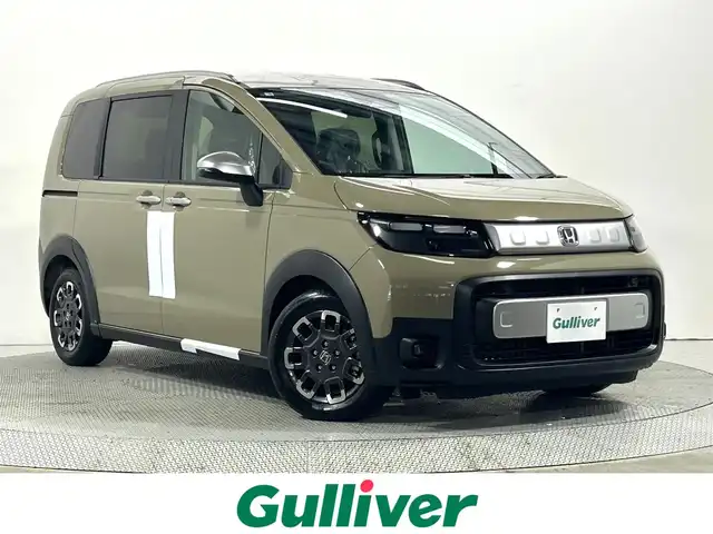 ホンダ フリード ハイブリット e:HEV クロスター 大阪府 2025(令7)年 0.1千km ベージュ 未使用車　ハーフレザー　純正ナビＴＶ　両側パワスラ　シートヒーター　バックカメラ　レーダークルコン　衝突軽減　レーンアシスト　クリアランスソナー　オートハイビーム　ＬＥＤヘッドライト　ＢＳＭ　禁煙車
