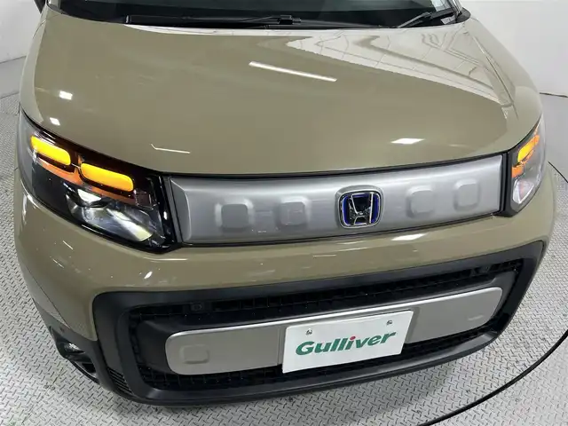 ホンダ フリード ハイブリット e:HEV クロスター 大阪府 2025(令7)年 0.1千km ベージュ 未使用車　ハーフレザー　純正ナビＴＶ　両側パワスラ　シートヒーター　バックカメラ　レーダークルコン　衝突軽減　レーンアシスト　クリアランスソナー　オートハイビーム　ＬＥＤヘッドライト　ＢＳＭ　禁煙車