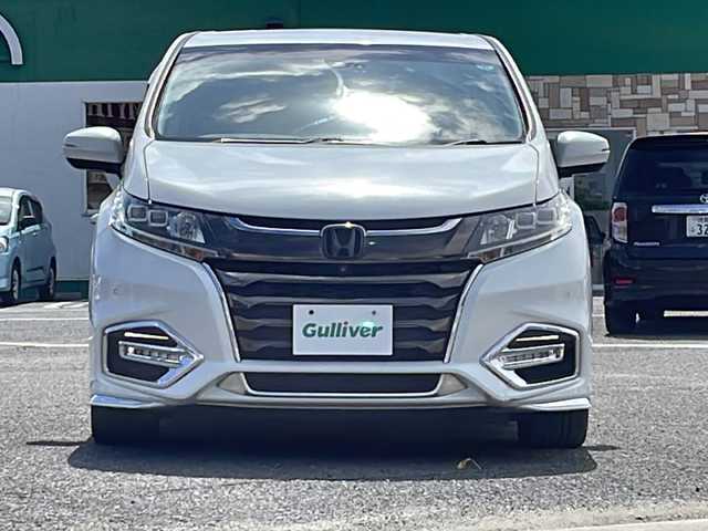 ホンダ オデッセイ ハイブリッド アブソルート・EXホンダセンジング 徳島県 2018(平30)年 8.4万km プラチナホワイトパール 純正9型ナビ　VXM-187VFNi/（SD/フルセグ/DISC/USB/iPod/BT/ラジオ）/バックカメラ/全方位カメラ/フリップダウンモニター/ハーフレザーシート/ビルトインETC2.0/追従式クルーズコントロール/ブラインドスポットモニター/D/N席パワーシート/両側電動スライドドア/リヤオートエアコン/D/N席シートヒーター/オートブレーキホールド/ドアバイザー/フォグライト/純正フロアマット/LEDヘッドライト