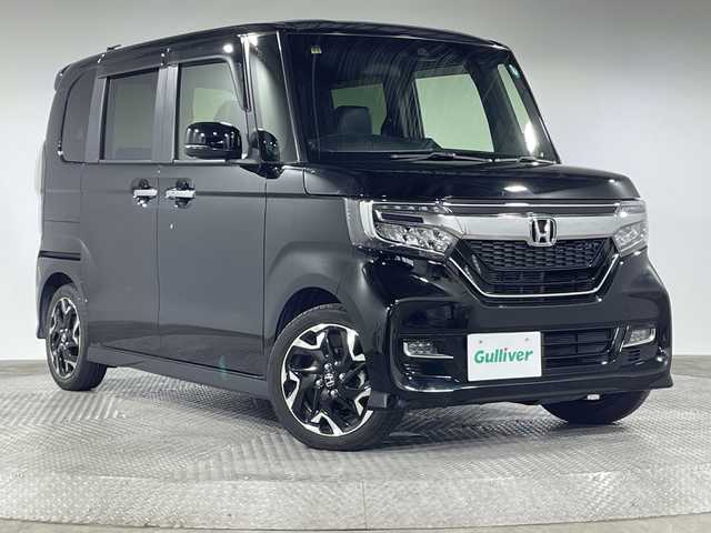 ホンダ Ｎ ＢＯＸ カスタム G L ターボ ホンダセンシング 神奈川県 2020(令2)年 2.6万km クリスタルブラックパール ホンダセンシング/純正8型ナビ/・BT/フルセグTV/CD/DVD/SD/AppleCarPlay/バックカメラ/ハーフレザーシート/シートヒーター(D/N)/ビルトインETC/両側電動スライドドア/革巻きステアリング/ステアリングスイッチ/パドルシフト/Autoライト/LEDヘッドライト/フォグランプ/2.5AUSBポート(2口)/スマートキー/プッシュスタートボタン/スペアキー/シートリフター/電動格納ミラー/ウィンカーミラー/純正フロアマット/純正15インチアルミホイール/純正ドアバイザー