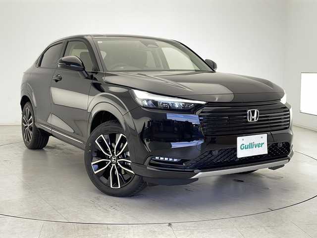 ホンダ ヴェゼル ハイブリッド e:HEV Z 千葉県 2025(令7)年 0.1千km クリスタルブラックパール 登録済未使用車/衝突軽減ブレーキ/純正ディスプレイオーディオ/（フルセグ/Bluetooth/USB/FM/AM/AplleCarPlay/AndroidAuto）/バックカメラ/ETC/アイドリングストップ/ハーフレザーシート/シートヒーター（運転席＋助手席）/ステアリングヒーター/パドルシフト/LEDヘッドライト/電動格納ミラー