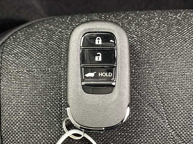 ホンダ ヴェゼル ハイブリッド e:HEV Z 千葉県 2025(令7)年 0.1千km クリスタルブラックパール 登録済未使用車/衝突軽減ブレーキ/純正ディスプレイオーディオ/（フルセグ/Bluetooth/USB/FM/AM/AplleCarPlay/AndroidAuto）/バックカメラ/ETC/アイドリングストップ/ハーフレザーシート/シートヒーター（運転席＋助手席）/ステアリングヒーター/パドルシフト/LEDヘッドライト/電動格納ミラー