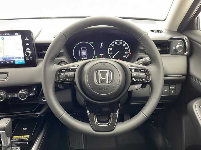 ホンダ ヴェゼル ハイブリッド e:HEV Z 千葉県 2025(令7)年 0.1千km クリスタルブラックパール 登録済未使用車/衝突軽減ブレーキ/純正ディスプレイオーディオ/（フルセグ/Bluetooth/USB/FM/AM/AplleCarPlay/AndroidAuto）/バックカメラ/ETC/アイドリングストップ/ハーフレザーシート/シートヒーター（運転席＋助手席）/ステアリングヒーター/パドルシフト/LEDヘッドライト/電動格納ミラー