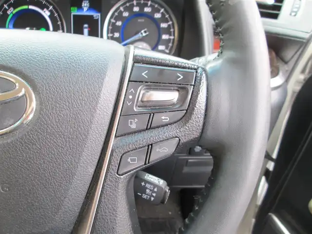 トヨタ ヴェルファイア ハイブリット V Lエディション 道央・札幌 2015(平27)年 3.9万km ホワイトパールクリスタルシャイン ワンオーナー/モデリスタエアロ/メーカーナビ、フルセグTV/JBLサウンドシステム/パノラミックビューモニター/リアエンターテイメントシステム/プリクラッシュセーフティ/ベージュレザーシート/前席パワーシート/シートヒーター/セカンドセミパワーシート/パワーバックドア/LEDヘッドライト&LEDフォグ/純正17インチアルミホイール/ウッドコンビハンドル/ステアリングヒーター/前後ドライブレコーダー/ビルトインETC/新車整備手帳/取扱説明書/スペアキー