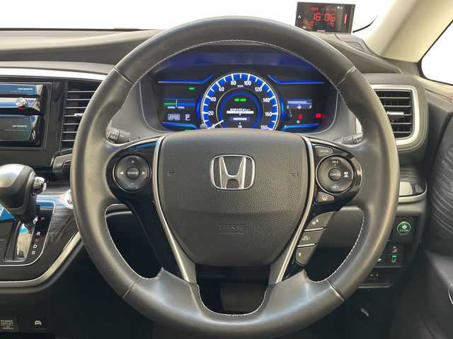 ホンダ オデッセイ ハイブリッド アブソルート・EXホンダセンジング 愛知県 2016(平28)年 5.5万km ホワイトオーキッドパール 純正ナビ/フリップダウンモニター/両側パワースライドドア/レーダークルーズコントロール/バックカメラ/パワーシート/純正アルミホイール/LEDヘッドライト/レーンキープアシスト/ドライブレコーダー/衝突軽減システム/フルセグ/CD DVD/Bluetooth/ステアリングスイッチ/スマートキー/プッシュスタート