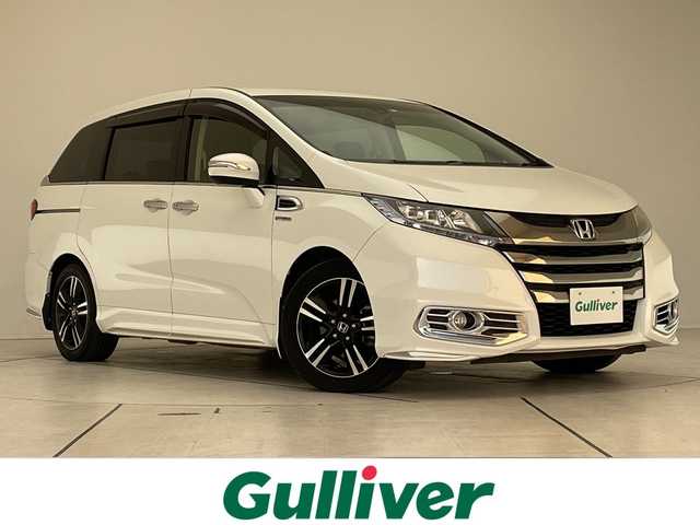 ホンダ オデッセイ ハイブリッド アブソルート・EXホンダセンジング 愛知県 2016(平28)年 5.5万km ホワイトオーキッドパール 純正ナビ/フリップダウンモニター/両側パワースライドドア/レーダークルーズコントロール/バックカメラ/パワーシート/純正アルミホイール/LEDヘッドライト/レーンキープアシスト/ドライブレコーダー/衝突軽減システム/フルセグ/CD DVD/Bluetooth/ステアリングスイッチ/スマートキー/プッシュスタート