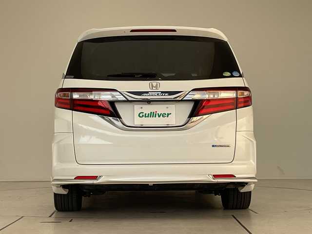 ホンダ オデッセイ ハイブリッド アブソルート・EXホンダセンジング 愛知県 2016(平28)年 5.5万km ホワイトオーキッドパール 純正ナビ/フリップダウンモニター/両側パワースライドドア/レーダークルーズコントロール/バックカメラ/パワーシート/純正アルミホイール/LEDヘッドライト/レーンキープアシスト/ドライブレコーダー/衝突軽減システム/フルセグ/CD DVD/Bluetooth/ステアリングスイッチ/スマートキー/プッシュスタート