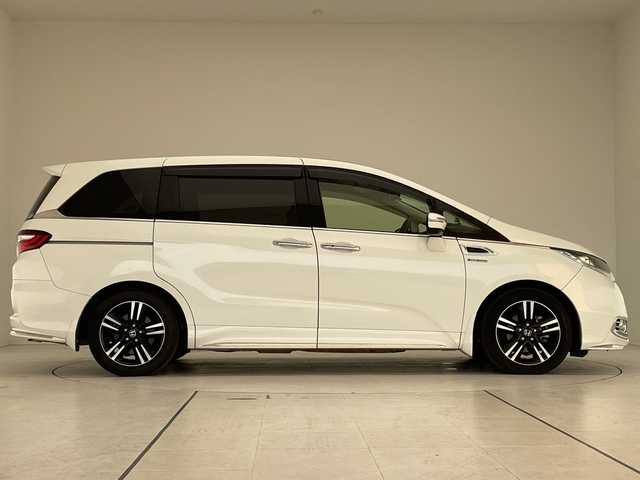 ホンダ オデッセイ ハイブリッド アブソルート・EXホンダセンジング 愛知県 2016(平28)年 5.5万km ホワイトオーキッドパール 純正ナビ/フリップダウンモニター/両側パワースライドドア/レーダークルーズコントロール/バックカメラ/パワーシート/純正アルミホイール/LEDヘッドライト/レーンキープアシスト/ドライブレコーダー/衝突軽減システム/フルセグ/CD DVD/Bluetooth/ステアリングスイッチ/スマートキー/プッシュスタート