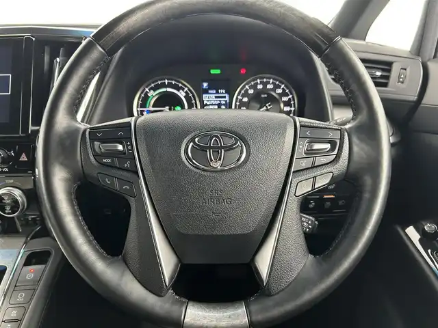 トヨタ アルファードハイブリット エグゼクティブ ラウンジ S 千葉県 2019(平31)年 1.4万km スパークリングブラックパールクリスタルシャイン 禁煙車/4WD/メーカーナビ/・型式510315/・CD/DVD/BT/BD/フルセグ/JBLサウンド/プリクラッシュセーフティ/レーントレーシングアシスト/クリアランスソナー/パーキングサポートブレーキ/レーダークルーズコントロール/両側パワースライドドア/パワーバックドア/レザーシート/前席パワーシート/１、２列目席シートヒーター/１、２列目席シートベンチレーション/純正フリップダウンモニター/デジタルインナールームミラー/全方位カメラ/ステアリングヒーター/LEDヘッドライト/オートハイビーム/フォグライト/AC100V1500W電源/スマートキー/クリアランスソナー/ビルトインETC2.0