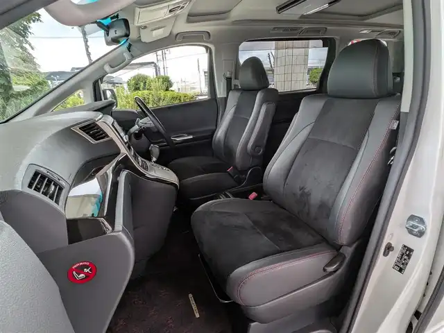 トヨタ ヴェルファイア 2．4Z ゴールデンアイズ 栃木県 2013(平25)年 12.2万km ホワイトパールクリスタルシャイン (株)IDOMが運営する【じしゃロン宇都宮店】の自社ローン専用車両になります。こちらは現金またはオートローンご利用時の価格です。自社ローンご希望の方は別途その旨お申付け下さい/禁煙車/サンルーフ/フリップダウンモニター/ＥＴＣ/社外７型ナビ/Ｂｌｕｅｔｏｏｔｈ接続/ＣＤ／ＤＶＤ/バックカメラ/オットマン/コーナーセンサー/パーキングアシスト/カーテンエアバッグ/両側パワースライドドア/オートライト/スマートキー/プッシュスタート/ドアバイザー/ウィンカーミラー/パワーバックドア